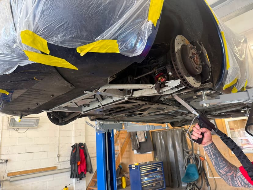 Dry ice cleaning a masked rear wheel arch