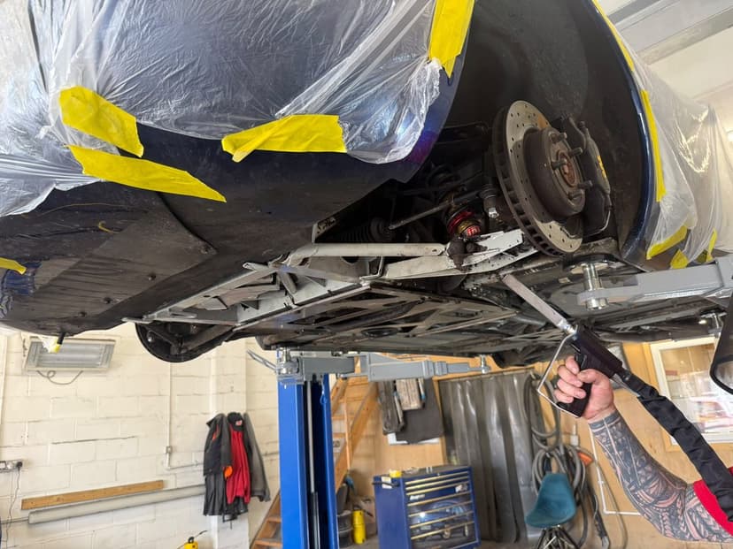 Dry ice cleaning a masked rear wheel arch