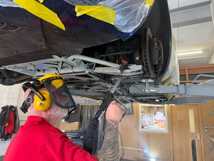 Dry ice applicator working along a chassis rail